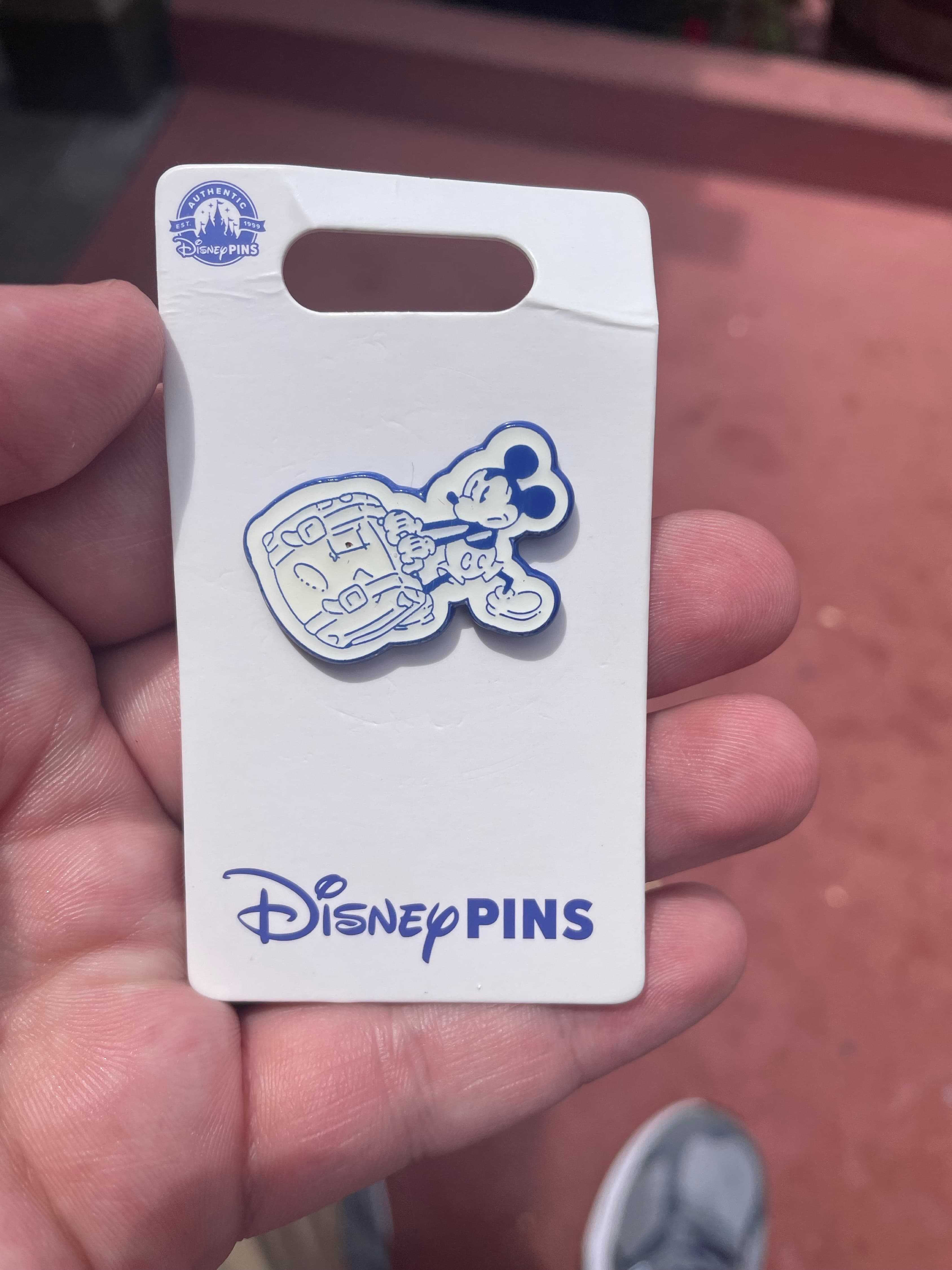 Mickey Lugging Suitcase